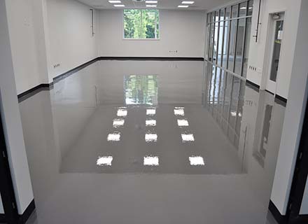 A retail space that has been upgraded with commercial epoxy flooring