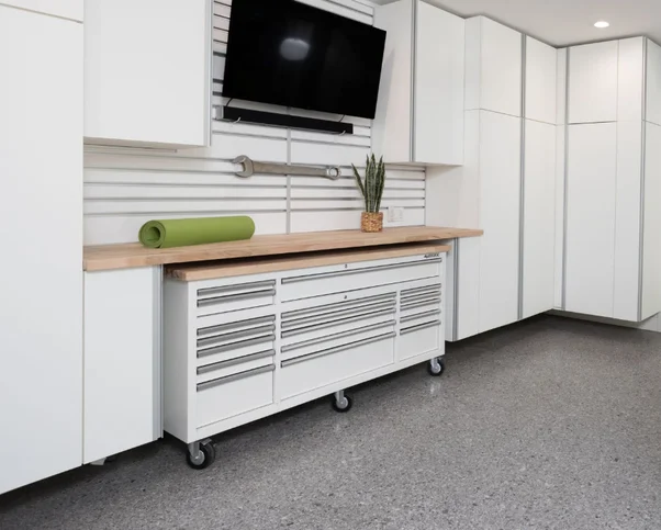 Light workbench with rolling tool chest.
